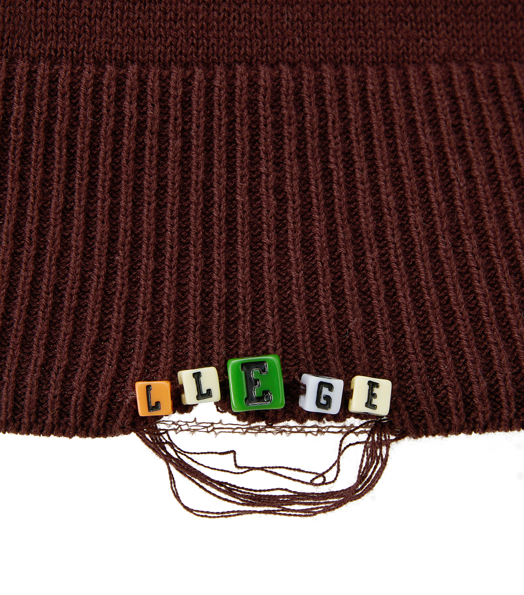 OVERSIZED CUBE DETAIL POLO KNIT